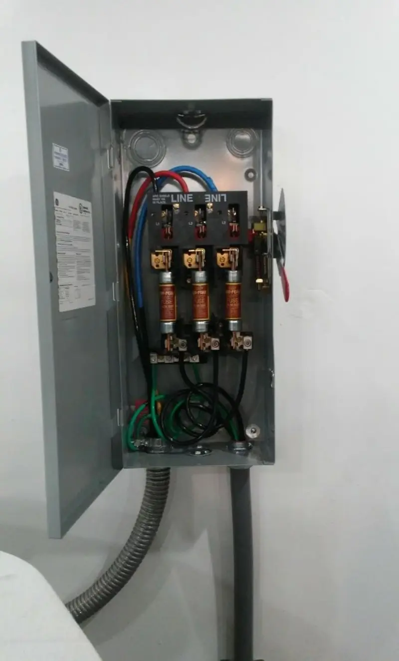 Three-phase disconnect switch installed for Smoke Detector Installation in Tomball